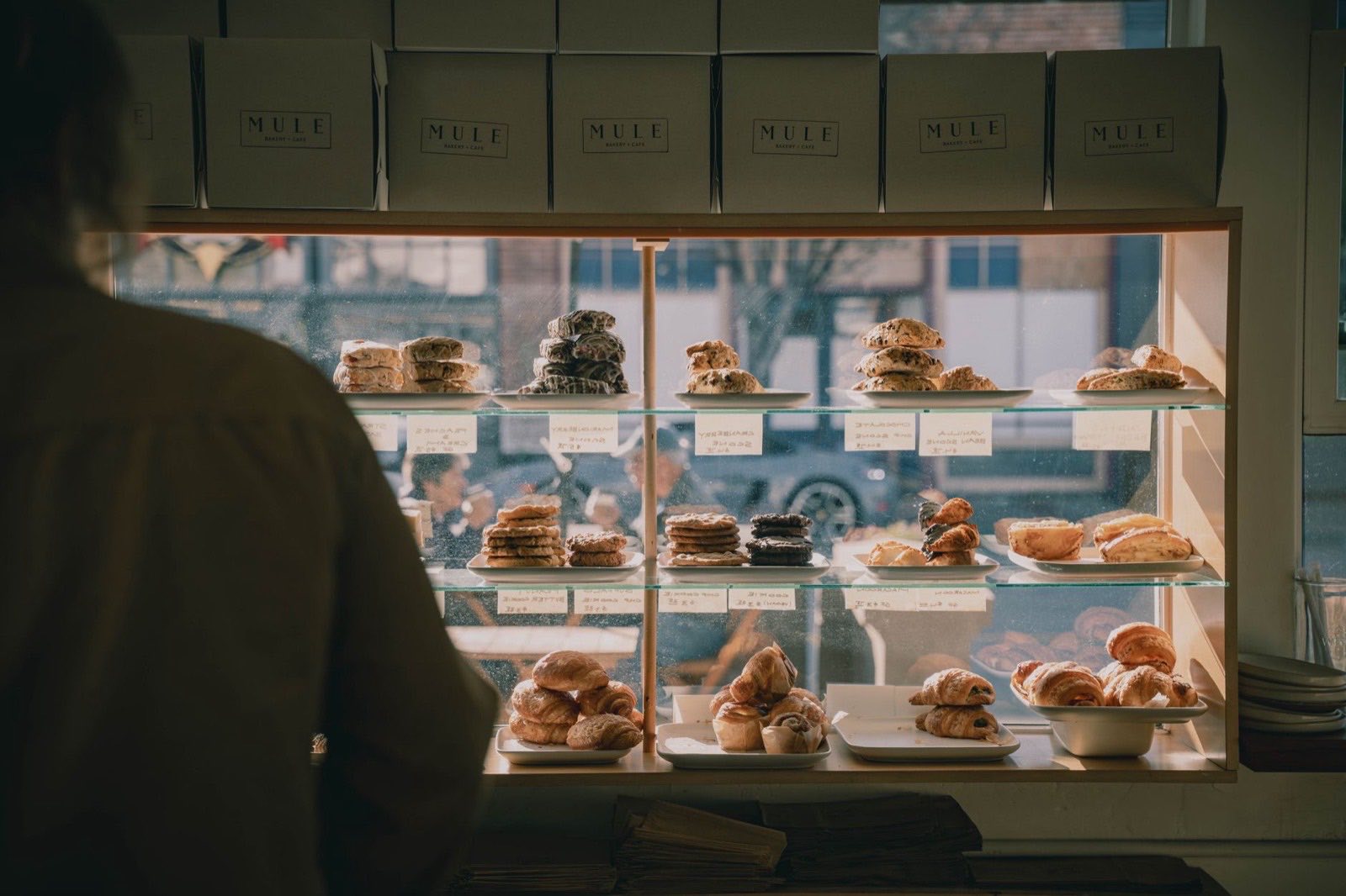 A bakery display case filled with pastries